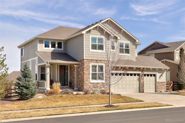 craftsman house featuring stone siding, a porch, concrete driveway, and a shingled roof