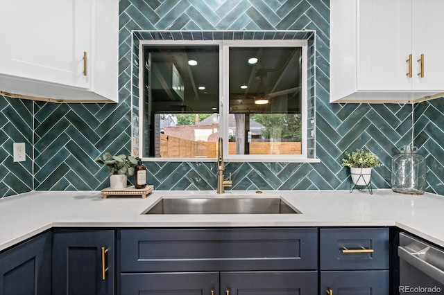 bar featuring backsplash, white cabinetry, stainless steel dishwasher, and sink