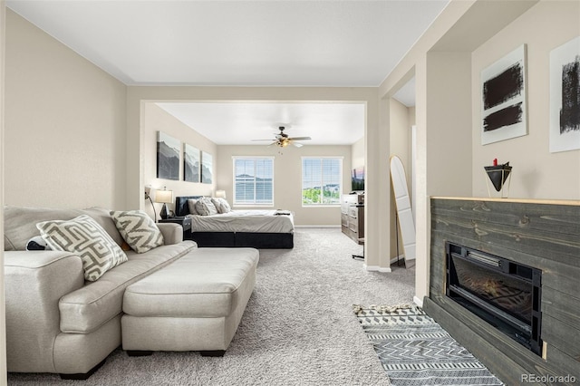 91 S Quantock St, Aurora, CO 80018 - bedroom with a glass covered fireplace, carpet flooring, and a ceiling fan