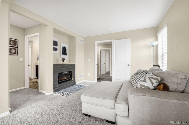 91 S Quantock St, Aurora, CO 80018 - living room with carpet flooring and a glass covered fireplace