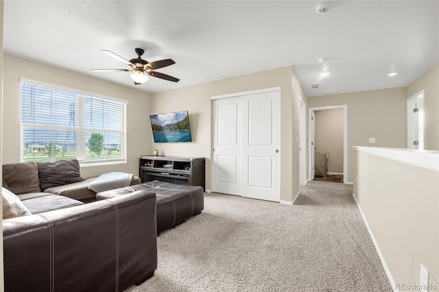 91 S Quantock St, Aurora, CO 80018 - living area featuring a ceiling fan and light colored carpet
