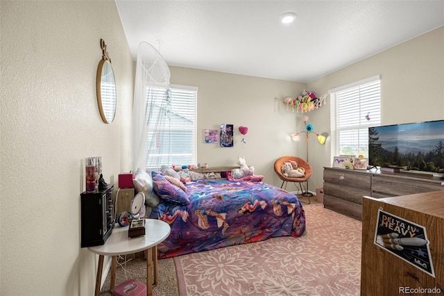 91 S Quantock St, Aurora, CO 80018 - bedroom featuring carpet floors and multiple windows