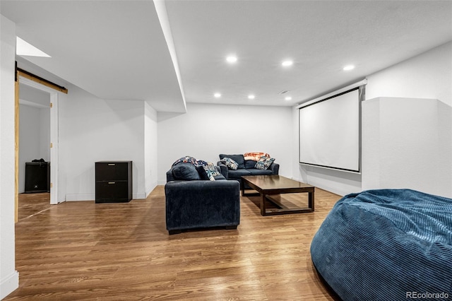 91 S Quantock St, Aurora, CO 80018 - home theater room with wood finished floors and recessed lighting