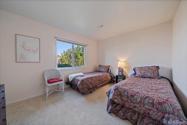 bedroom featuring visible vents