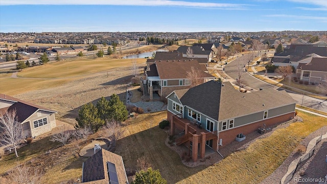 aerial view with a residential view and a water view