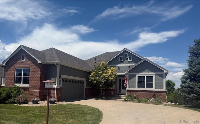 22725 E Long Dr, Aurora, CO 80016 - craftsman-style house featuring brick siding, driveway, board and batten siding, and a front lawn