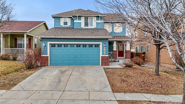 view of front of property featuring a shingled roof, brick siding, driveway, and an attached garage