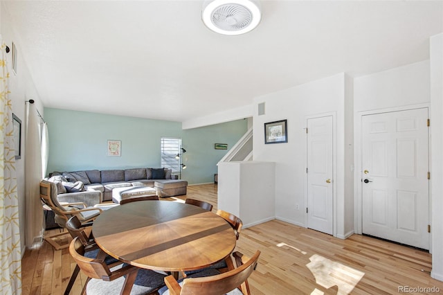 dining room featuring light hardwood / wood-style floors