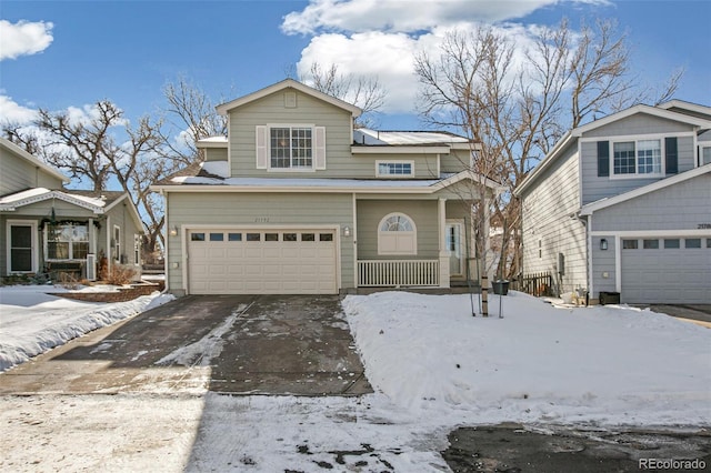 front of property featuring a garage