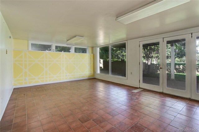 3561 Kalispell St, Aurora, CO 80011 - unfurnished sunroom featuring french doors