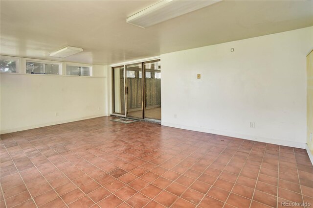 3561 Kalispell St, Aurora, CO 80011 - spare room with baseboards