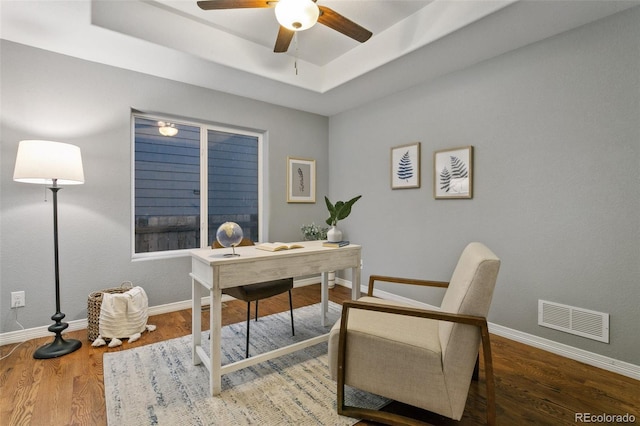 9632 Emerald Vista Dr, Peyton, CO 80831 - office space with a raised ceiling, a ceiling fan, and wood finished floors