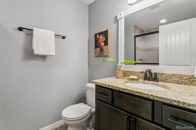 9632 Emerald Vista Dr, Peyton, CO 80831 - bathroom featuring vanity, a stall shower, and a textured wall