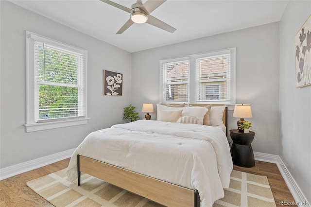 3334 W 37th Ave, Denver, CO 80211 - bedroom featuring wood finished floors, baseboards, and a ceiling fan