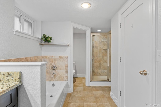 3334 W 37th Ave, Denver, CO 80211 - bathroom with toilet, a garden tub, a stall shower, vanity, and baseboards