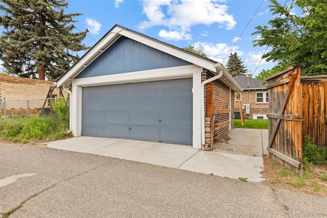 3334 W 37th Ave, Denver, CO 80211 - view of front facade featuring a garage and brick siding