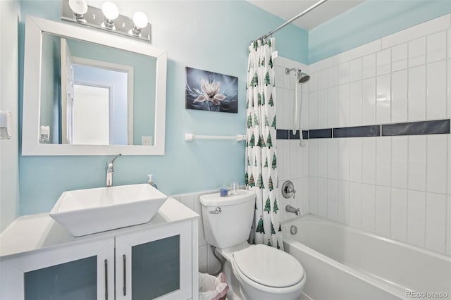 7075 Welch Ct, Arvada, CO 80004 - full bath with vanity, shower / bath combo, and toilet
