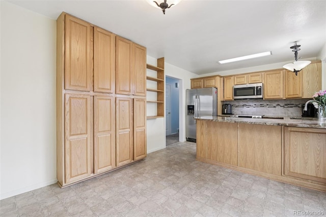 7075 Welch Ct, Arvada, CO 80004 - kitchen featuring stainless steel appliances, open shelves, stone countertops, a sink, and a peninsula