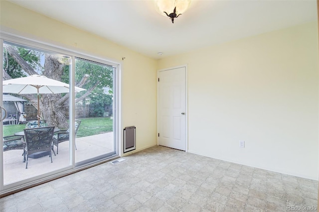 7075 Welch Ct, Arvada, CO 80004 - spare room with baseboards and stone finish floors
