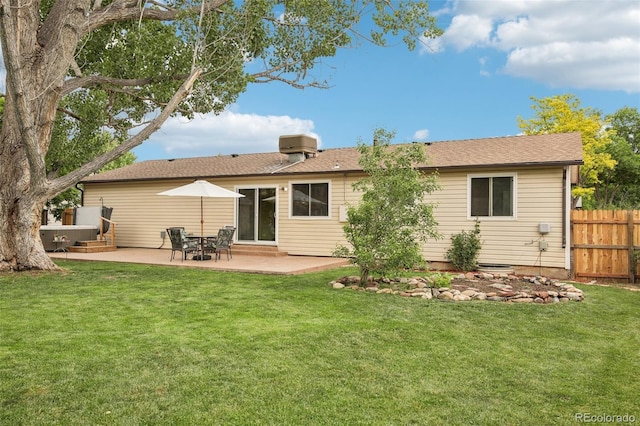 7075 Welch Ct, Arvada, CO 80004 - back of property featuring a patio area