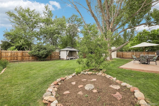 7075 Welch Ct, Arvada, CO 80004 - view of yard with a patio area