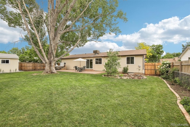 7075 Welch Ct, Arvada, CO 80004 - rear view of house featuring a patio area