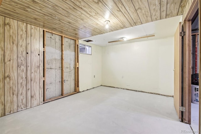 7075 Welch Ct, Arvada, CO 80004 - below grade area featuring wooden walls and wooden ceiling