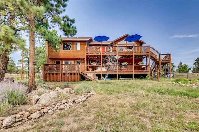 378 Conifer Dr, Bailey, CO 80421 - rear view of house with stairs and a deck