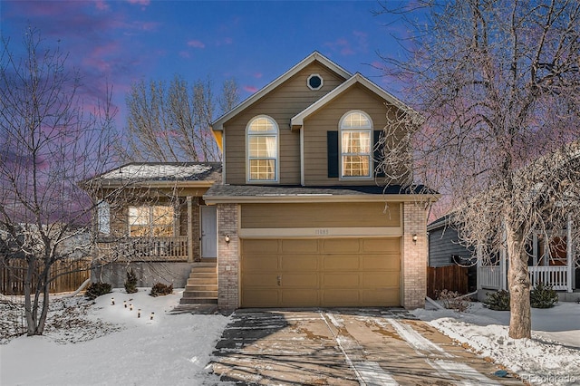 view of front of property featuring a garage