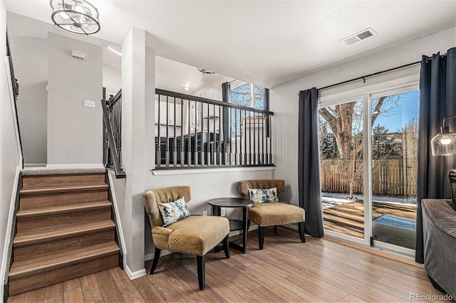 sitting room with light hardwood / wood-style flooring