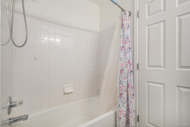 bathroom featuring shower / bath combination with curtain