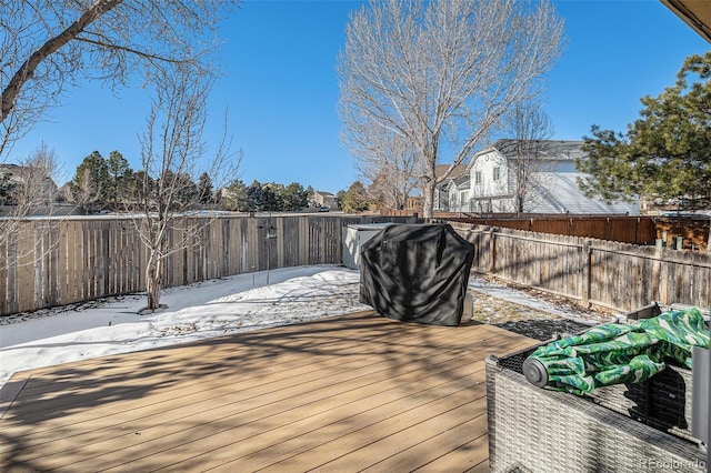 view of snow covered deck