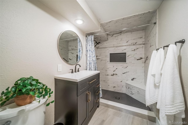 18159 E Crestline Cir, Centennial, CO 80015 - bathroom featuring vanity and tiled shower