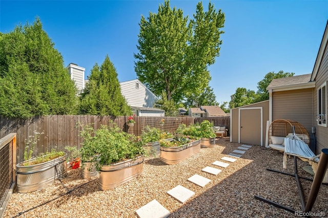 18159 E Crestline Cir, Centennial, CO 80015 - fenced backyard with a garden and a shed
