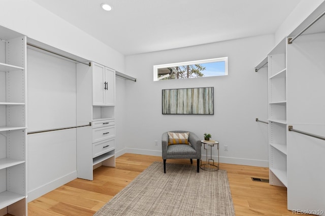 walk in closet featuring light wood-type flooring