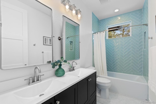 full bathroom with vanity, toilet, and shower / bath combo with shower curtain