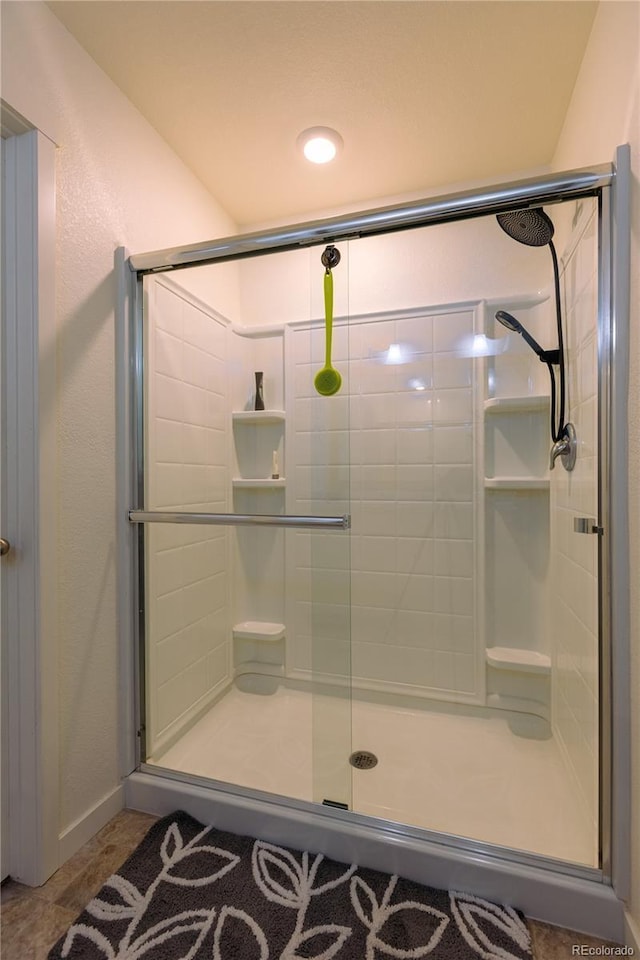 236 Racer St, Bennett, CO 80102 - full bathroom with a stall shower