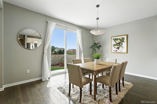 12554 Hudson Ct, Thornton, CO 80241 - dining room featuring dark wood-style floors