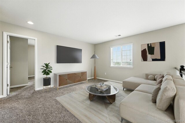 12554 Hudson Ct, Thornton, CO 80241 - living area with carpet and recessed lighting