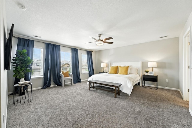 12554 Hudson Ct, Thornton, CO 80241 - bedroom featuring carpet flooring, ceiling fan, and a textured ceiling