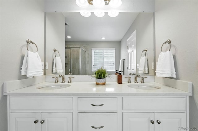 12554 Hudson Ct, Thornton, CO 80241 - bathroom with a shower stall and double vanity