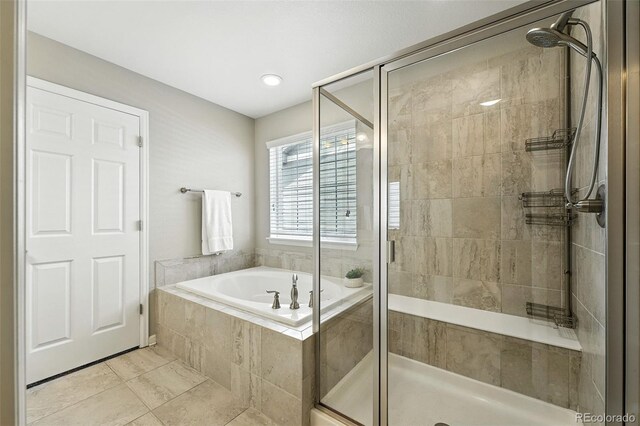 12554 Hudson Ct, Thornton, CO 80241 - bathroom with a bath, a stall shower, and tile patterned floors