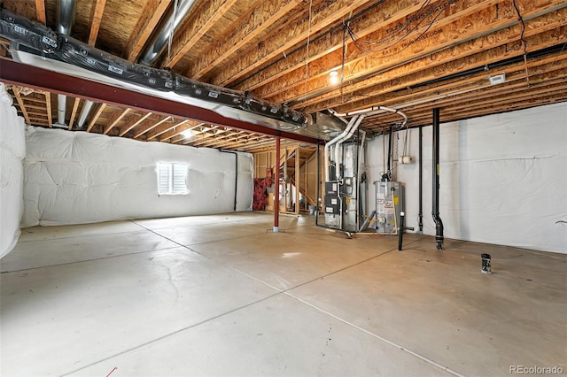 12554 Hudson Ct, Thornton, CO 80241 - below grade area featuring heating unit and gas water heater