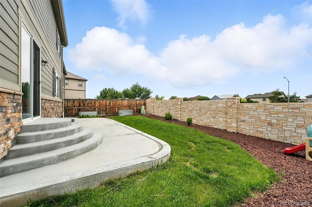12554 Hudson Ct, Thornton, CO 80241 - fenced backyard featuring a patio