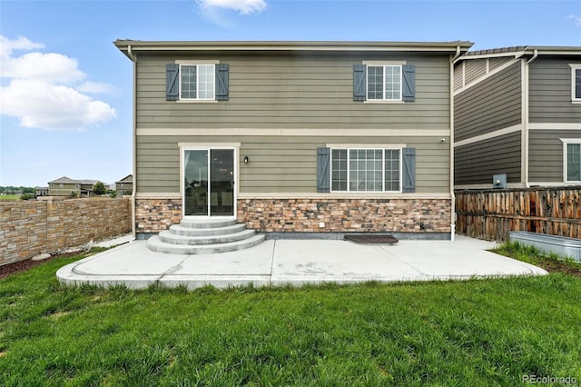 12554 Hudson Ct, Thornton, CO 80241 - rear view of house featuring a patio