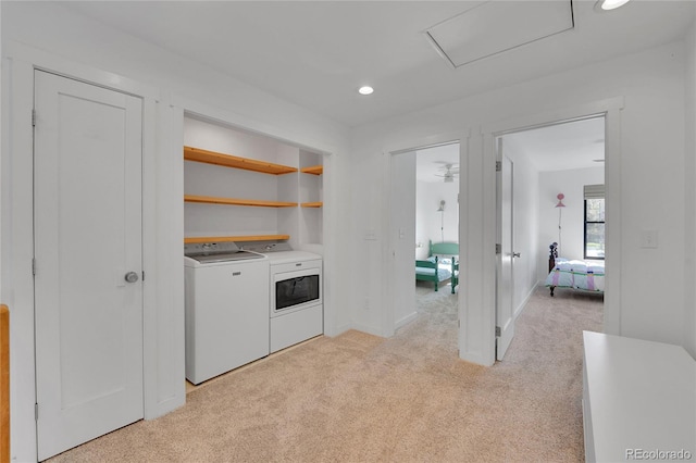 washroom with laundry area, washer and dryer, baseboards, recessed lighting, and light colored carpet