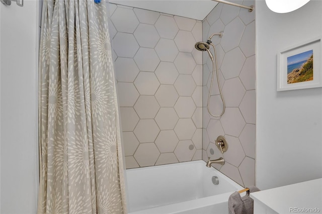 full bathroom featuring shower / bath combination with curtain