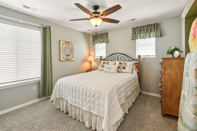 bedroom featuring visible vents, baseboards, and carpet floors