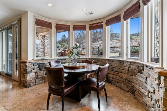 sunroom / solarium featuring visible vents