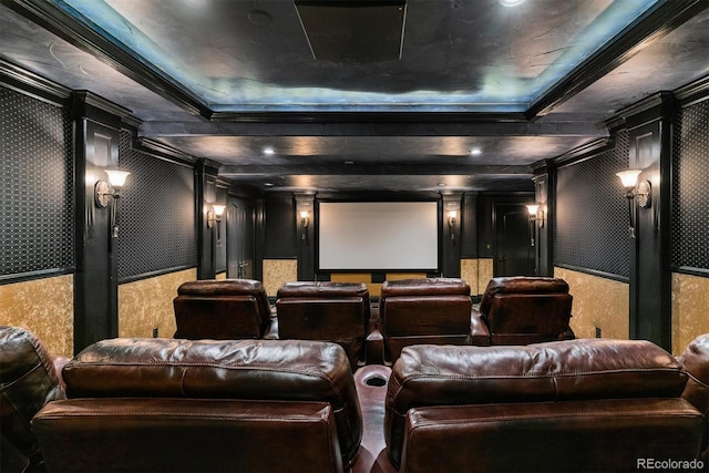 home theater room featuring ornamental molding
